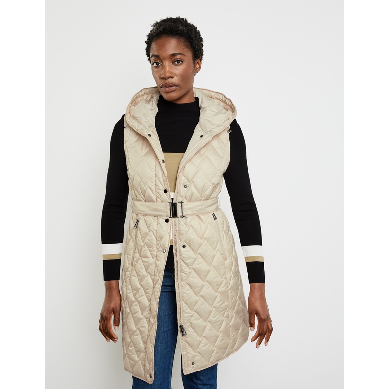 Quilted Body Warmer With A Waist Belt And Hood
