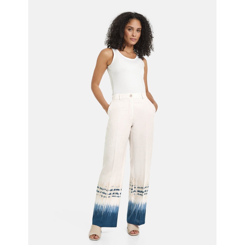 Linen Trousers With A Patterned Hem