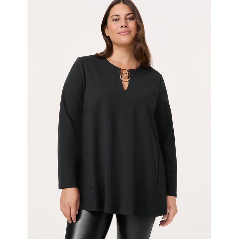 Flared Long Sleeve Top With A Decorative Detail