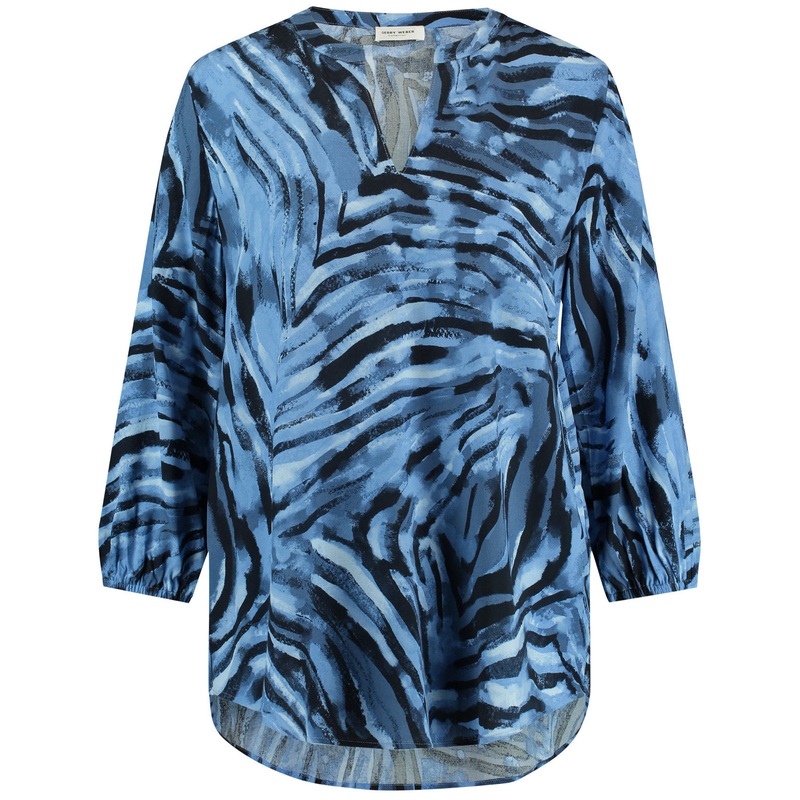 Long Blouse Top With A Rounded Hem Flared